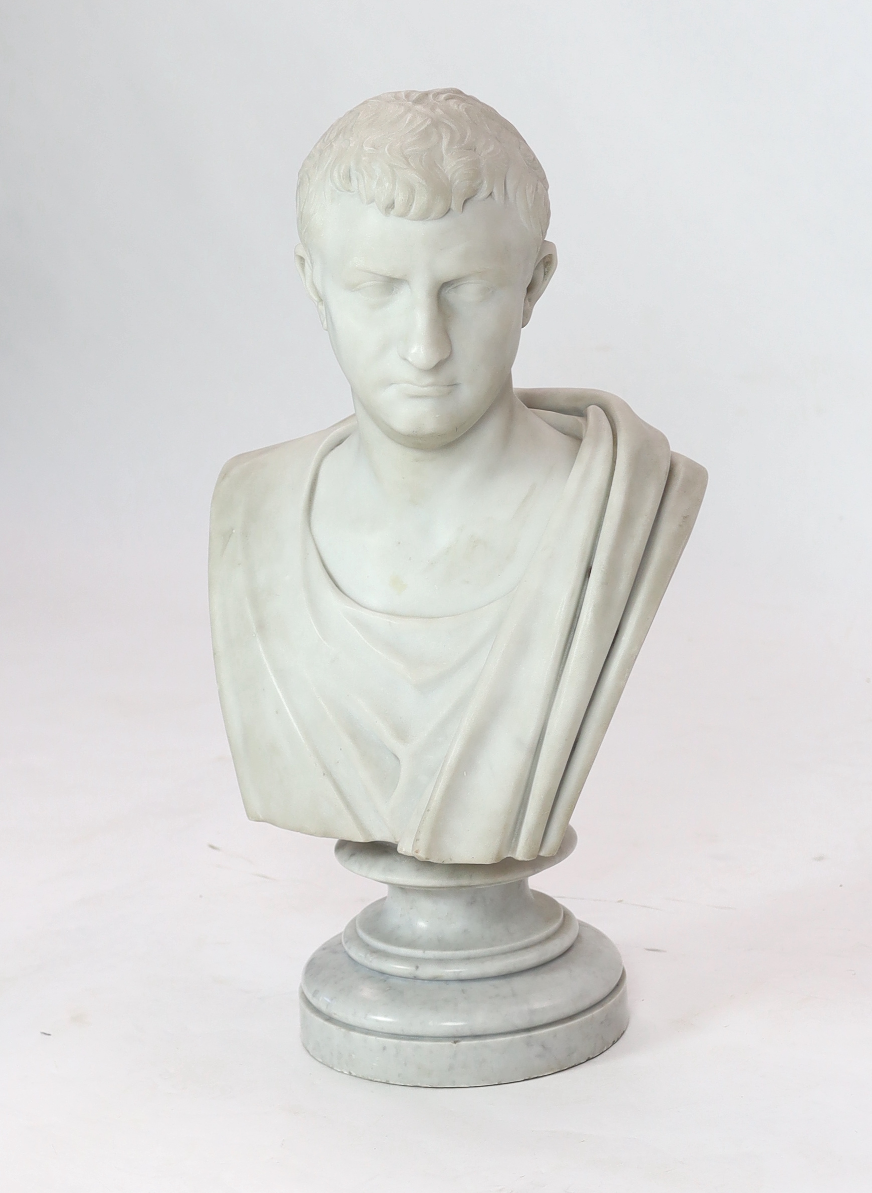Studio of Orazio Andreioni (c.1840-1895), a 19th century Italian white marble bust of a Roman Emperor, possibly Tiberius, 41cm wide, 30cm deep, overall 75cm high, Please note this lot attracts an additional import tax of